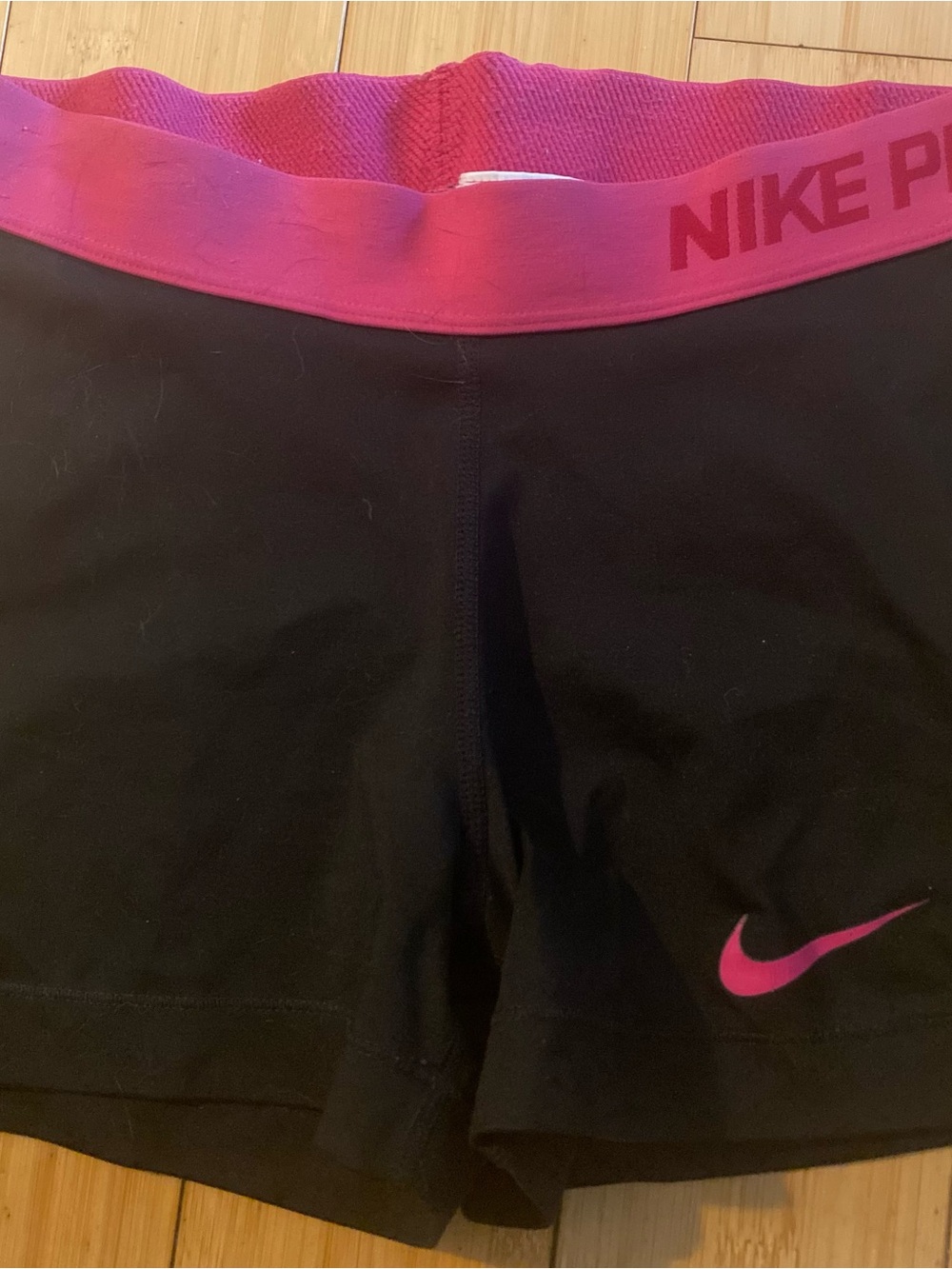 Nike Women's Black Shorts with Pink Waistband and Swoosh